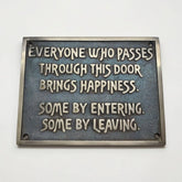 Personalized bronze plaque with motivational quote on a white background