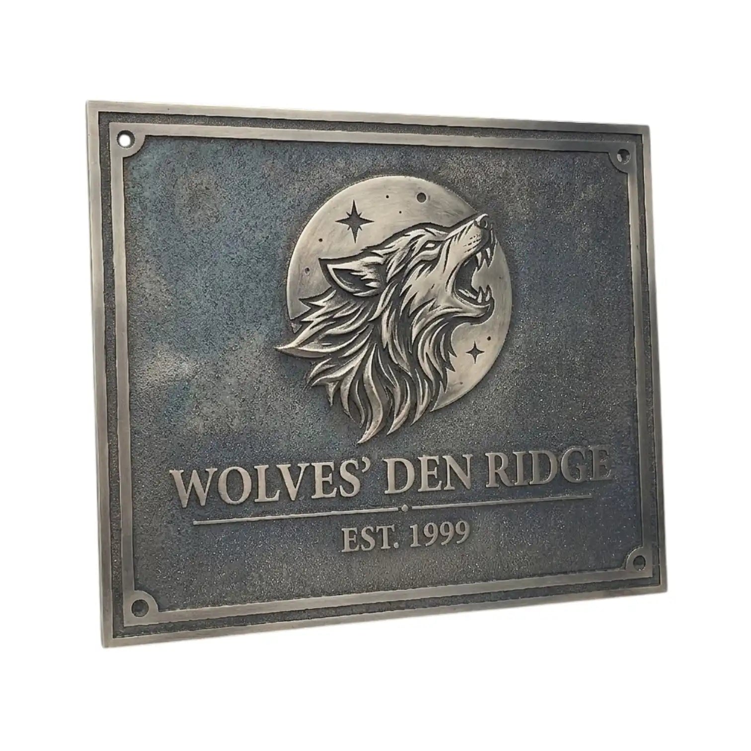 Bronze plaque with a wolf emblem and 'Wolves' Den Ridge' text on a white background