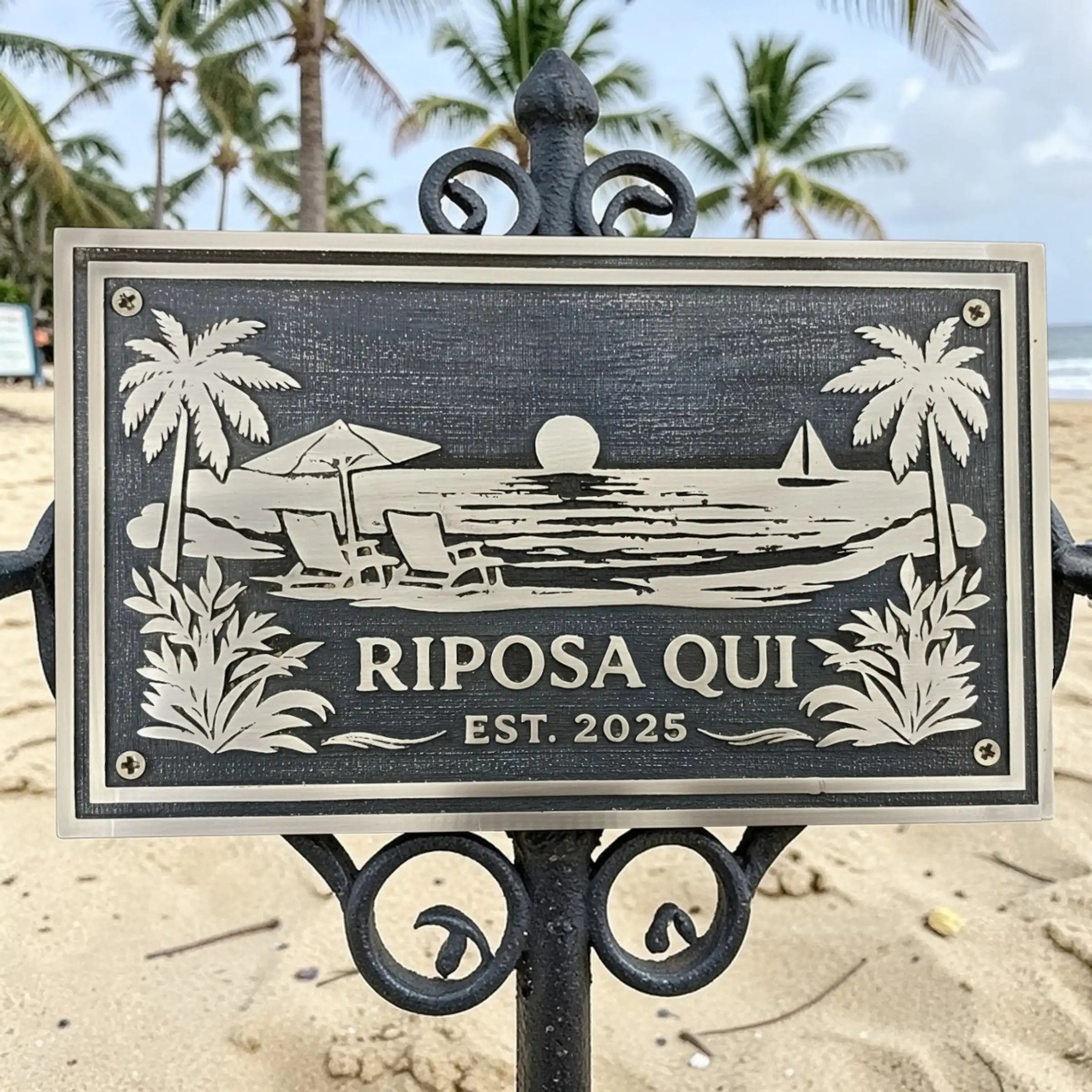 Bronze address sign with beach scene and 'Riposa Qui' text on a beach background