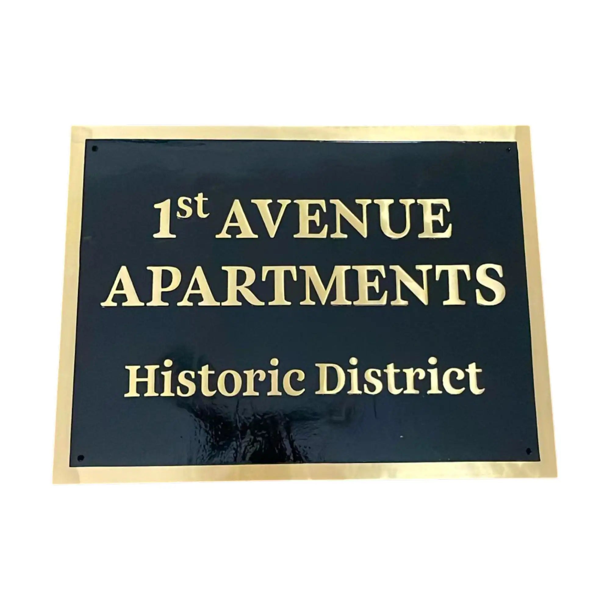 Address Sign for 1st Avenue Apartments in Historic District with gold text on a black background
