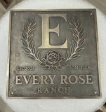 Custom Bronze Plaques -  Address Plaques with 'E' and floral design, featuring 'Every Rose Ranch' text.