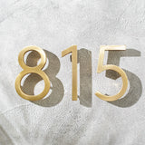 Solid brass floating house numbers with hidden stud mounting for modern house addresses, mailboxes, doors, and room numbering.